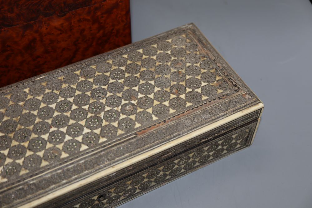 An amboyna jewellery box, 30 x 18 x 14cm, a pen stand and a Damascus box